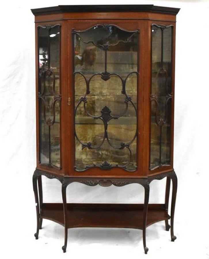 A mahogany two door glass display cabinet with cabriole legs