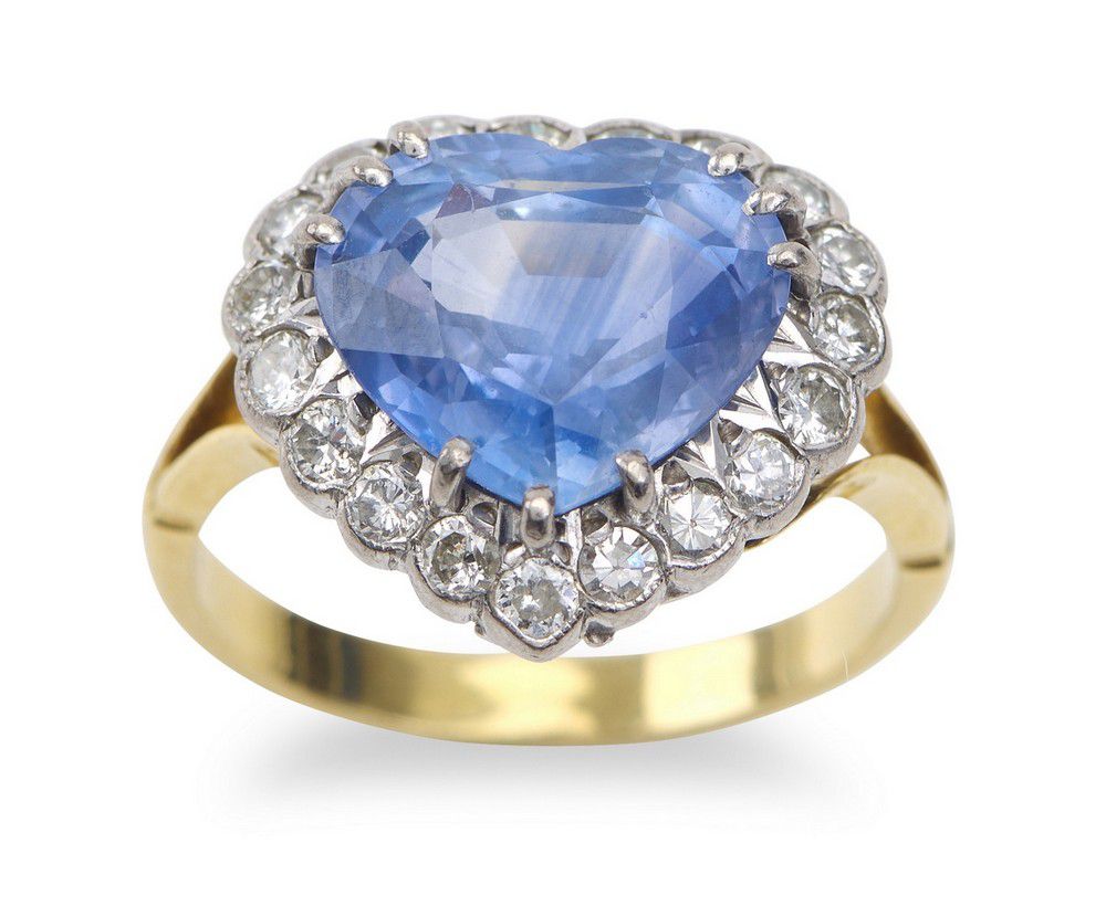 A sapphire and diamond ring, featuring a heart cut sapphire… - Rings ...