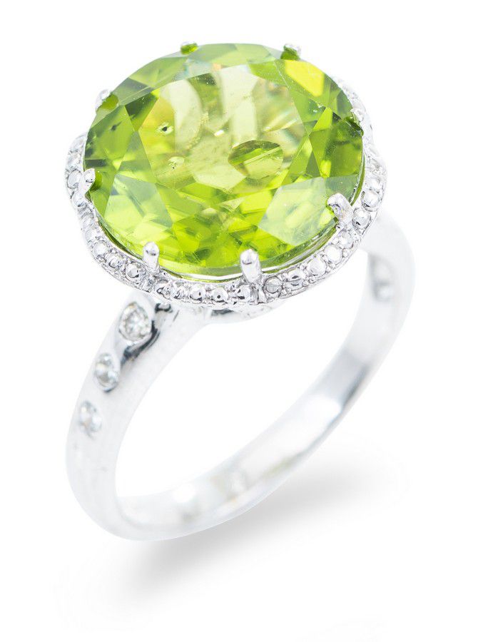 A peridot and diamond ring, the round faceted peridot of 9.… - Rings ...