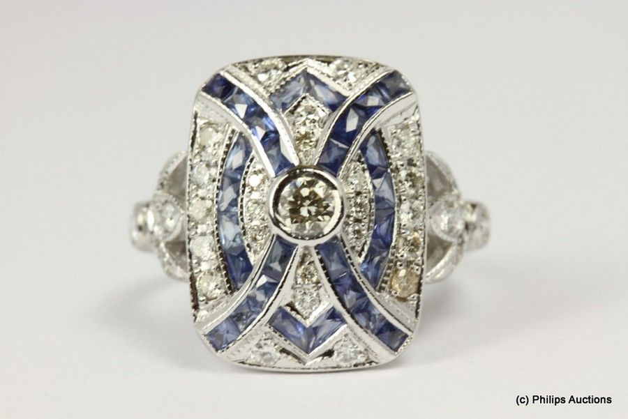 An Art Deco sapphire and diamond plaque ring, 18ct white