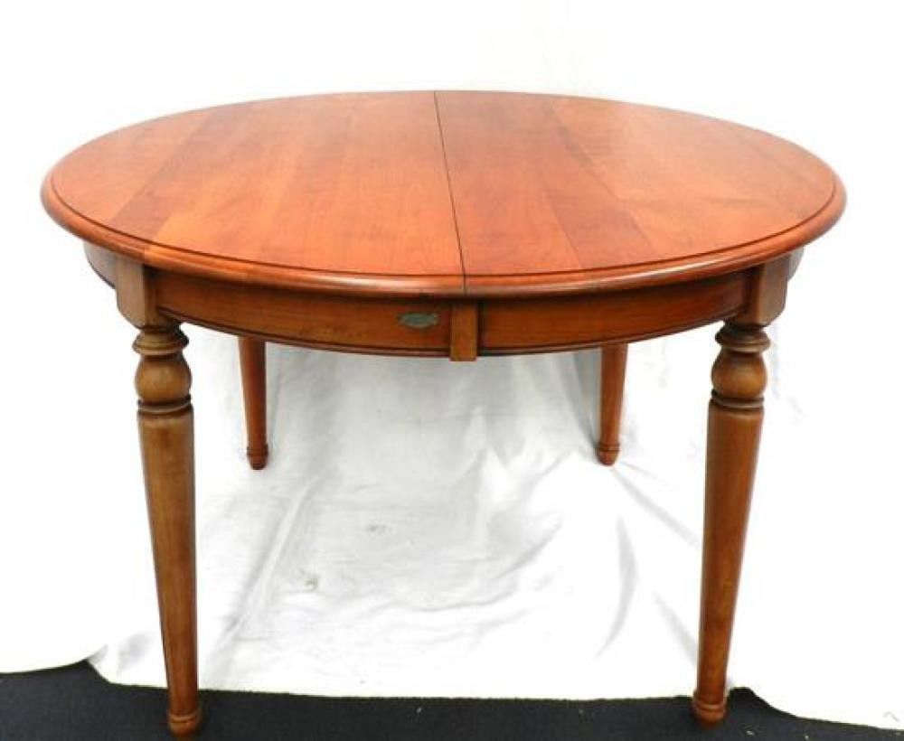 An Bree France furniture elm circular dining table, 75 x 120 cm