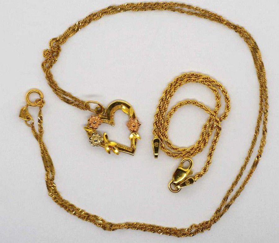 14ct gold heart necklace and bracelet, pendant and chain marked ...