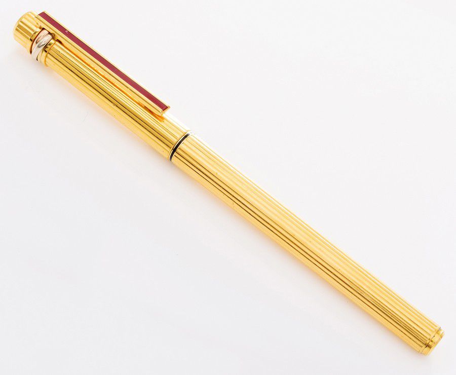 A fountain pen by Cartier, the gold 