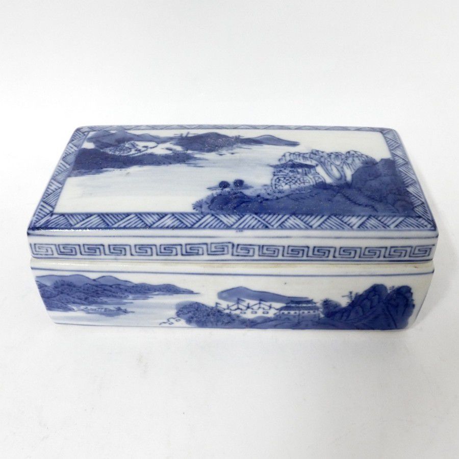 A Chinese blue and white porcelain lidded writing box, with two… Ceramics Chinese Oriental