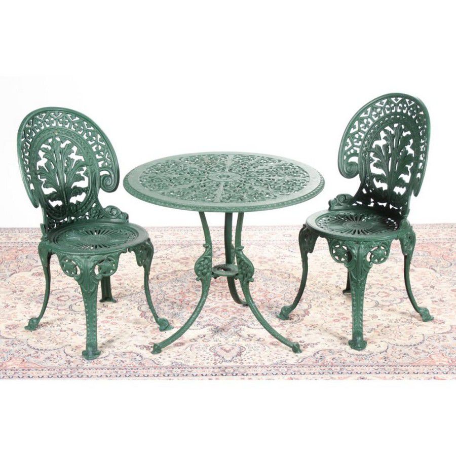 wrought iron small table and two chairs