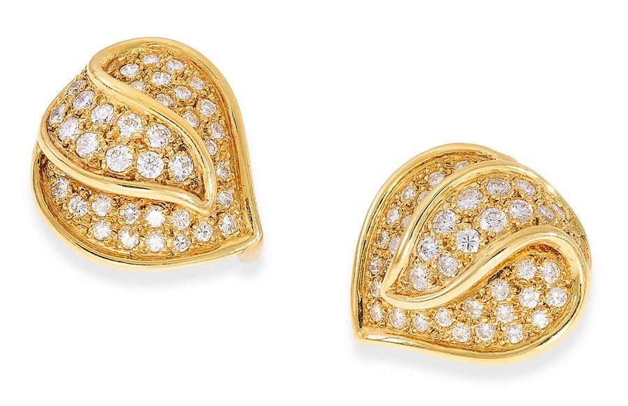 A pair of diamond earrings, each earrings grain set with round ...