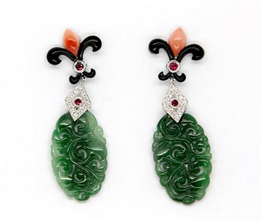 A pair of carved jade and gemstone earrings in the Deco style ...