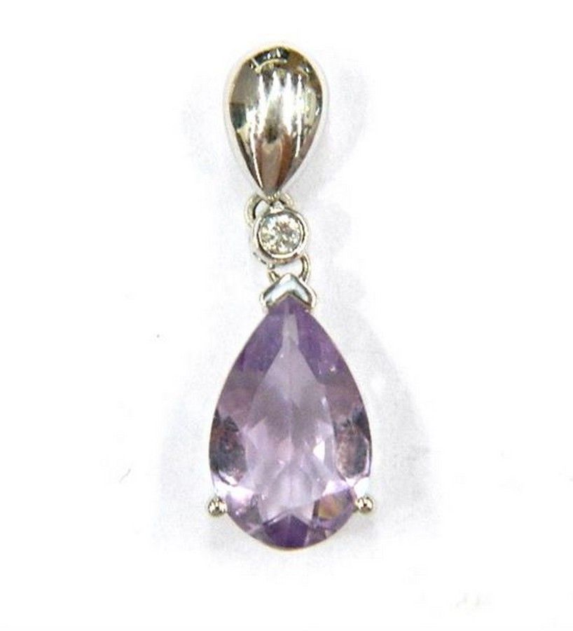 An 18ct white gold amethyst & diamond pendant, one pear shaped ...