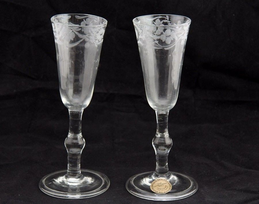 A pair Georgian wine glasses, each with baluster stem and… - British ...