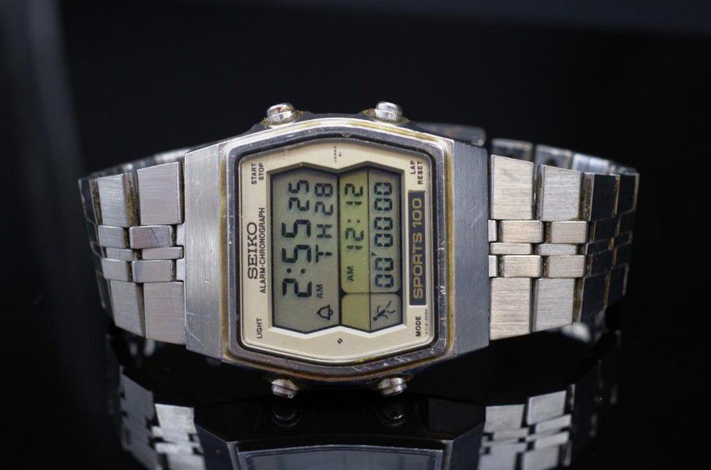 Seiko Sport 100 Digital Alarm Watch with Running Man - Bracelets/Bangles -  Jewellery