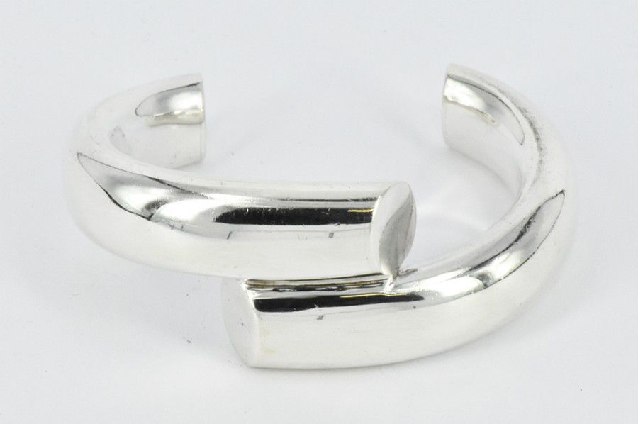 A sterling silver bangle. Diameter 57 mm. Weight 43.6g. - Bracelets ...