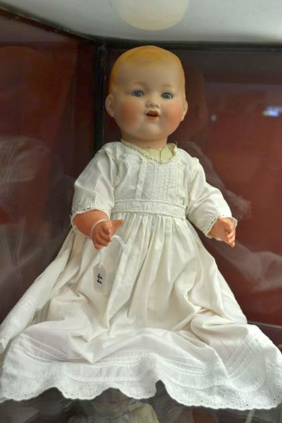 Beautiful Early German Bisque Doll with Expressive Features