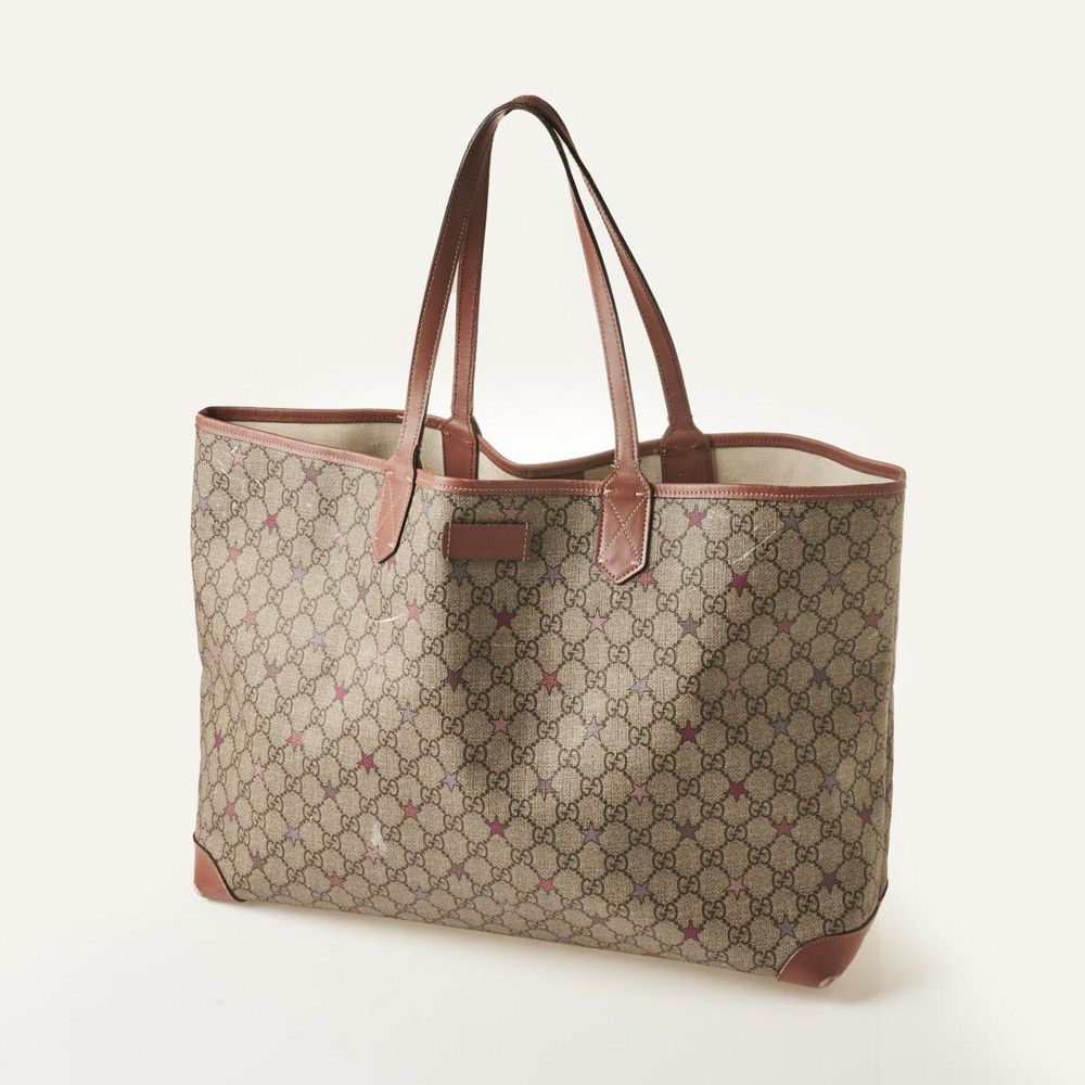 A Gucci Caryall GG canvas star tote bag. Made in Italy.… - Handbags ...