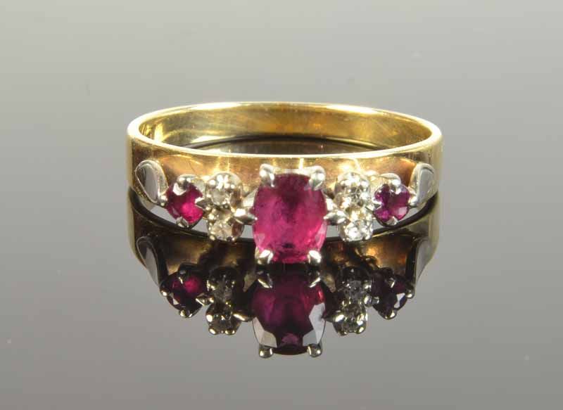 9ct yellow gold ruby & diamond ring, with a central oval ruby… - Rings