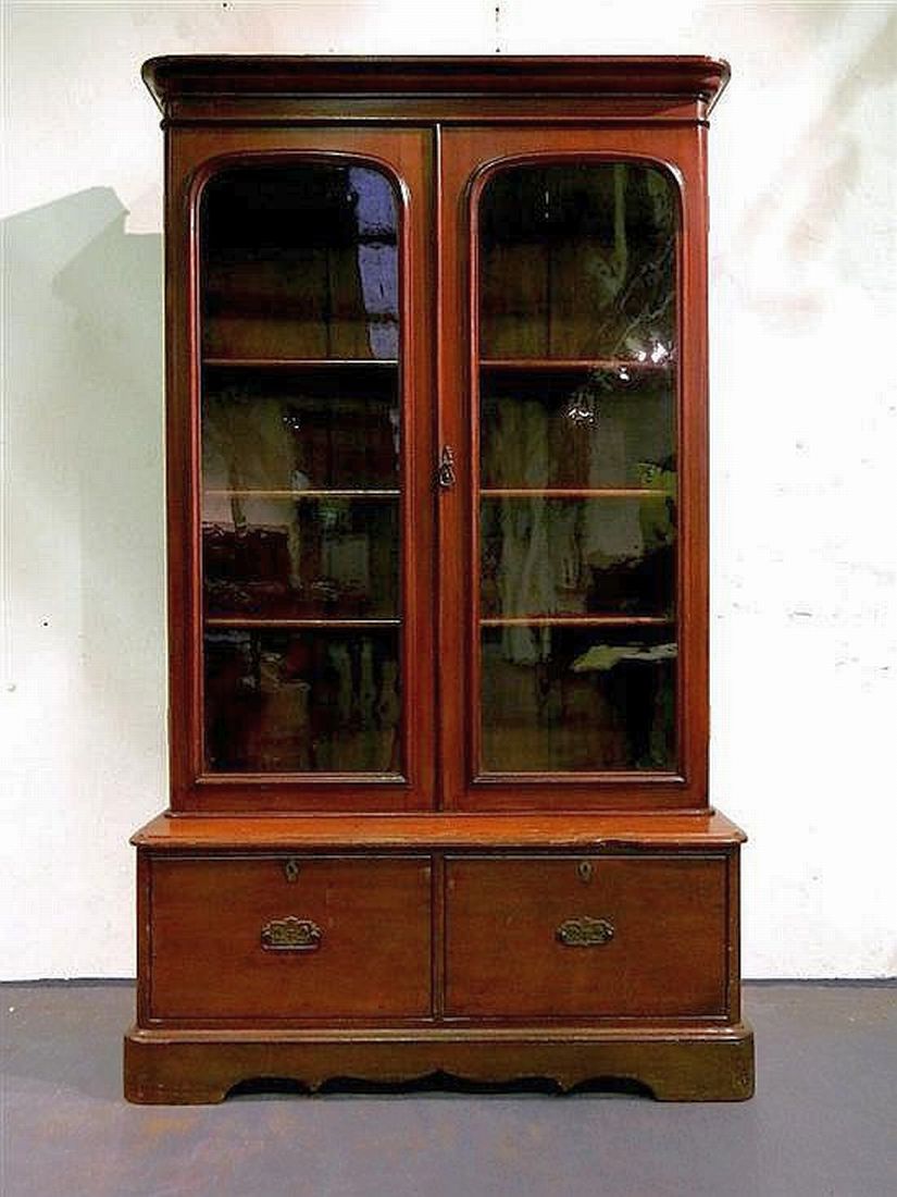 An Australian Colonial cedar bookcase, with stepped cornice