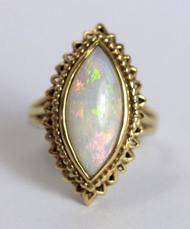 An opal dress ring, 9ct yellow gold, made as a large marquise… - Rings ...