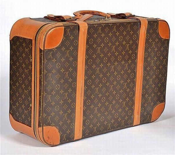 A suitcase by Louis Vuitton, styled in monogram canvas with tan… - Luggage & Travelling ...
