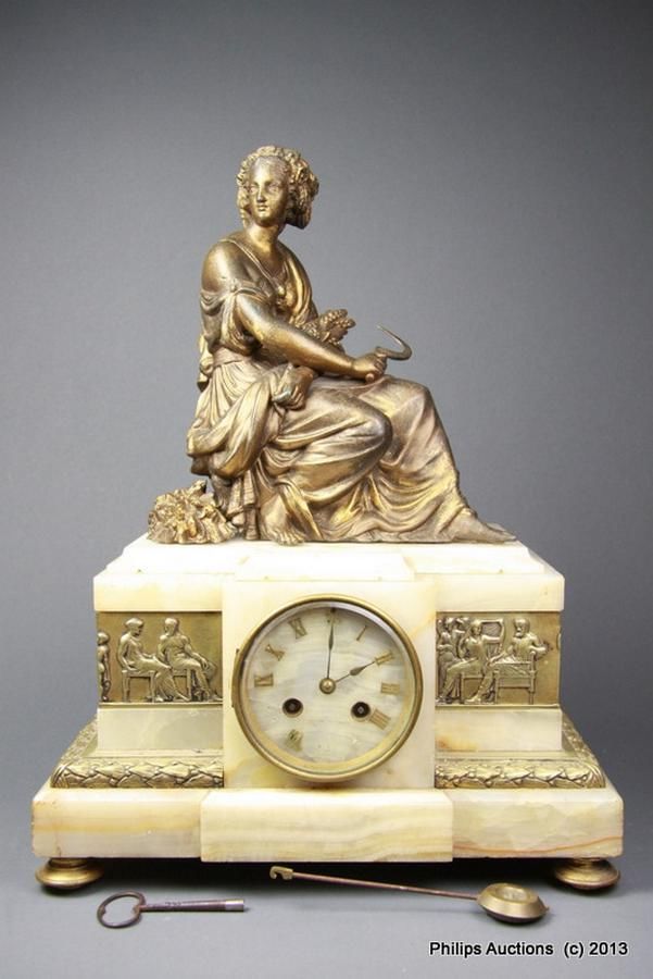 A fine French ormolu and onyx figural clock, circa 1880s, with ...