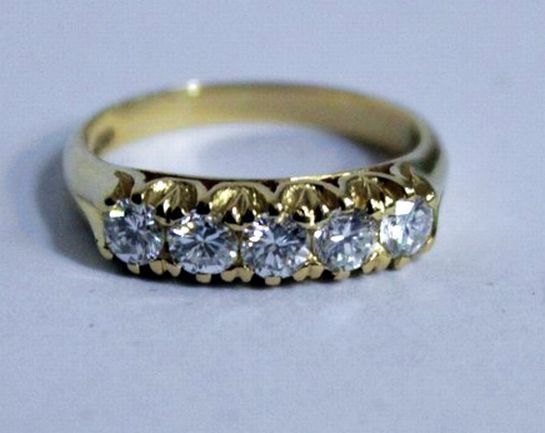  18  carat  gold ring  set with five diamonds Rings  Jewellery 