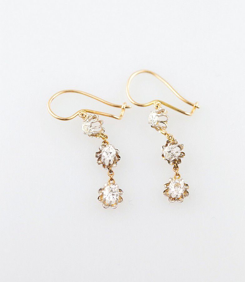 Pair 15ct diamond pendant earrings, each of three individual ...